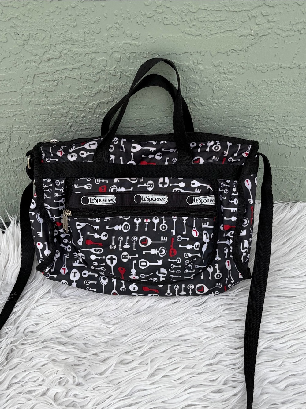 Lesportsac Black Messenger Bag with Red & White Key Print